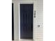 Entry door with modern hardware, a video doorbell, and a unit number on a well-maintained exterior at 16841 Askins Loop # 208, Parker, CO 80134