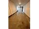 Spacious garage with concrete floor, ready for customization and offering secure parking and storage solutions at 16841 Askins Loop # 208, Parker, CO 80134