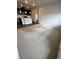 Open living space adjacent to the kitchen, offering seamless flow and comfortable living at 16841 Askins Loop # 208, Parker, CO 80134