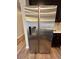 Stainless steel refrigerator in the kitchen, offering ample storage space and a modern aesthetic at 16841 Askins Loop # 208, Parker, CO 80134