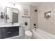 Modern bathroom featuring tiled shower and stylish vanity at 3355 S Flower St # 95, Lakewood, CO 80227