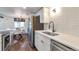 Modern kitchen with stainless steel appliances, stylish cabinets, and open design at 3355 S Flower St # 95, Lakewood, CO 80227
