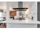 Kitchen view with open layout and eat in bar at 3355 S Flower St # 95, Lakewood, CO 80227