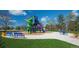 Community playground with colorful slides and play structures, providing a fun and safe environment for children at 3355 S Flower St # 95, Lakewood, CO 80227