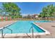 Community swimming pool with clear blue water, perfect for relaxation and recreation on sunny days at 3355 S Flower St # 95, Lakewood, CO 80227
