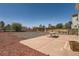 Large backyard featuring a patio with a picnic table and wood fence at 20336 E 48Th Dr, Denver, CO 80249