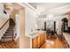 Open-concept layout connecting kitchen and dining area, perfect for entertaining at 20336 E 48Th Dr, Denver, CO 80249