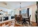Elegant dining room featuring gleaming hardwood floors and stylish furniture at 20336 E 48Th Dr, Denver, CO 80249