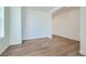 Sunlit room with hardwood floors and neutral walls at 5546 Inland Ave, Firestone, CO 80504