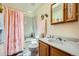 Bathroom with a vanity, sink, and a bathtub/shower combination at 18150 Martingale Rd, Monument, CO 80132