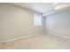 Bedroom with neutral paint, carpeting and a window that provides natural light at 14223 Piney River Rd, Broomfield, CO 80023