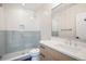 Modern bathroom with a walk-in shower and a floating vanity at 760 Jersey St, Denver, CO 80220