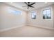 Bright bedroom featuring neutral walls and carpet flooring at 760 Jersey St, Denver, CO 80220