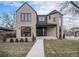 Modern two-story home with brick exterior and landscaped lawn at 760 Jersey St, Denver, CO 80220