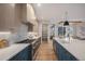 Bright kitchen with light wood cabinets and a large center island at 760 Jersey St, Denver, CO 80220