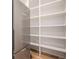 Spacious walk-in pantry with ample shelving for storage at 760 Jersey St, Denver, CO 80220