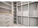 Spacious walk-in closet with shelves and hanging rods at 760 Jersey St, Denver, CO 80220