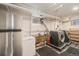 Functional laundry room with modern appliances, sink, and storage solutions at 2646 Colorado Blvd, Denver, CO 80207
