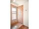 Updated shower with tiled walls, glass door, and modern fixtures at 1557 Fillmore St, Denver, CO 80206
