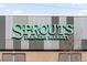 The storefront of Sprouts Farmers Market showcasing the logo and exterior design at 1557 Fillmore St, Denver, CO 80206