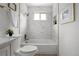 Bright bathroom features marble accents, modern tub, and stylish gold trim at 5329 Flower Cir, Arvada, CO 80002