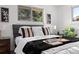 Bright bedroom featuring a comfortable bed with stylish accents and natural light at 5329 Flower Cir, Arvada, CO 80002