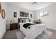 Cozy bedroom with a plush bed, stylish nightstands, and plenty of natural light at 5329 Flower Cir, Arvada, CO 80002