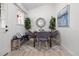 Cozy dining area with modern decor, stylish rug, and natural light at 5329 Flower Cir, Arvada, CO 80002