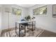 Bright office space with a desk, open windows, and decorative rug at 5329 Flower Cir, Arvada, CO 80002