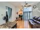 Open living room with high ceilings and natural light at 5987 S Pierson St, Littleton, CO 80127