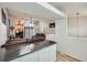 Open-concept living area featuring a spacious layout, modern finishes, and abundant natural light at 5987 S Pierson St, Littleton, CO 80127