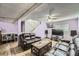 Relaxing basement featuring cozy seating, a large TV, and stylish decor for entertainment at 5987 S Pierson St, Littleton, CO 80127