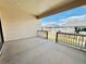 Spacious covered patio offers an idyllic outdoor retreat with views of the yard, perfect for relaxing or entertaining guests at 9032 Middle Fork St, Littleton, CO 80125