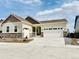 A charming one-story home boasting a two-car garage and a well-manicured lawn, blending comfort and curb appeal at 9032 Middle Fork St, Littleton, CO 80125