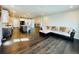 Large living room offers an open layout and easy access to kitchen at 9032 Middle Fork St, Littleton, CO 80125