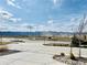 Expansive neighborhood view features neatly designed landscaping and beautiful mountain views, creating an inviting and picturesque setting at 9032 Middle Fork St, Littleton, CO 80125