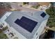 Aerial view of a roof with solar panels in a residential neighborhood, promoting sustainable energy at 9855 Chatswood Trl, Highlands Ranch, CO 80126