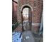 Brick archway gate to shared backyard at 1369 N Downing St # 3, Denver, CO 80218