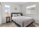 Cozy bedroom with a double bed and side table at 15501 E 112Th Ave # 6F, Commerce City, CO 80022