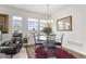 Elegant dining area with glass table and comfortable seating at 15501 E 112Th Ave # 6F, Commerce City, CO 80022