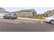 Exterior view of the property and parking lot at 15501 E 112Th Ave # 6F, Commerce City, CO 80022