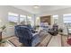 Open concept living area featuring a cozy seating arrangement at 15501 E 112Th Ave # 6F, Commerce City, CO 80022