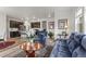 Living room with open floor plan and kitchen view at 15501 E 112Th Ave # 6F, Commerce City, CO 80022
