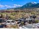 Aerial view of homes and mountain backdrop at 1838 Pearl # C, Boulder, CO 80302