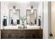 Spa-like bathroom with double vanity, modern fixtures and white tile at 1838 Pearl # C, Boulder, CO 80302
