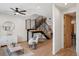 Open living room with hardwood floors and modern staircase at 1838 Pearl # C, Boulder, CO 80302