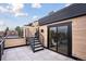 Modern rooftop deck with access from sliding glass doors at 1838 Pearl # C, Boulder, CO 80302