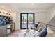 Modern wet bar with wine cooler and access to a rooftop deck at 1838 Pearl # C, Boulder, CO 80302