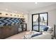 Modern wet bar with wine cooler and access to a rooftop deck at 1838 Pearl # C, Boulder, CO 80302