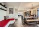 Open-concept dining area featuring a built-in bench and modern chandelier for Gathering gatherings at 3361 Mariposa St, Denver, CO 80211